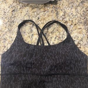 Lululemon size 10 brand new energy bra long line. Leopard camo deep coral color